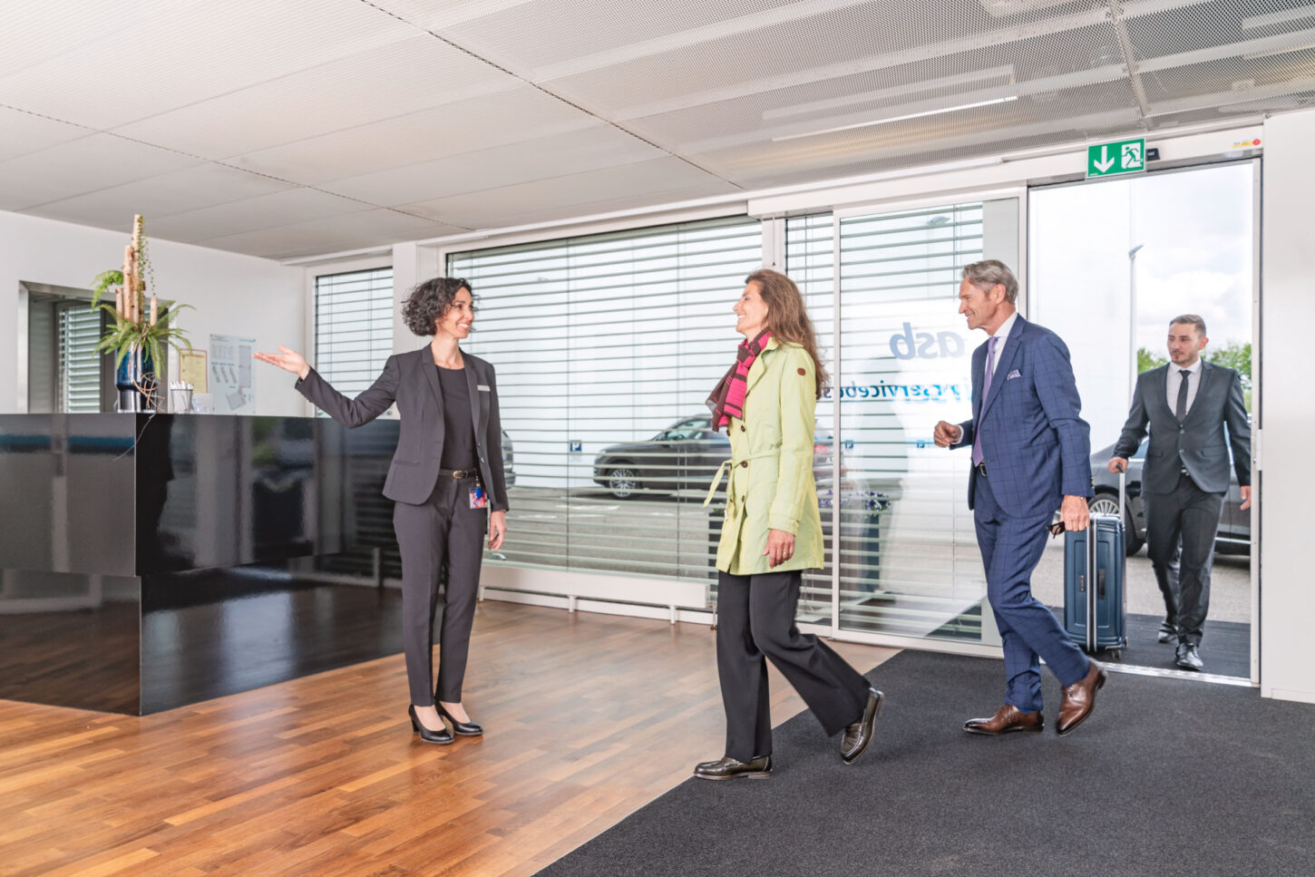 couple entering the private ASB airport terminal
