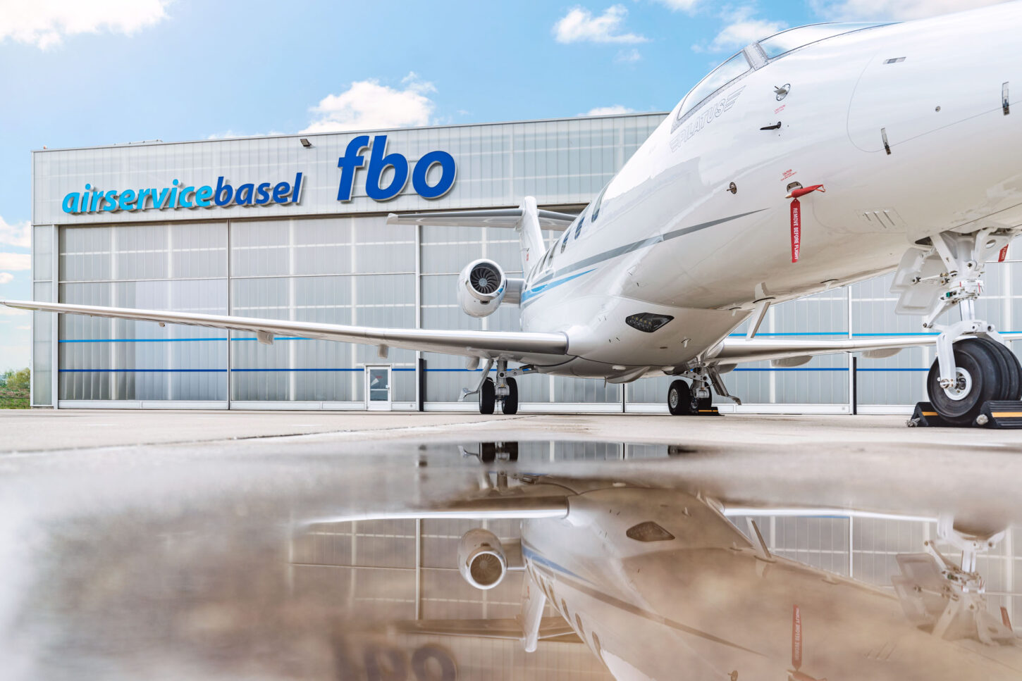parked aircraft in front of the asb hangar